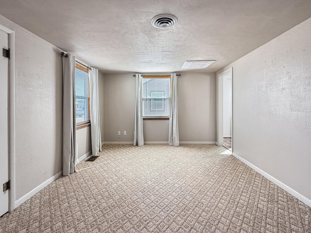 Property Photo 9 Spacious Living Room