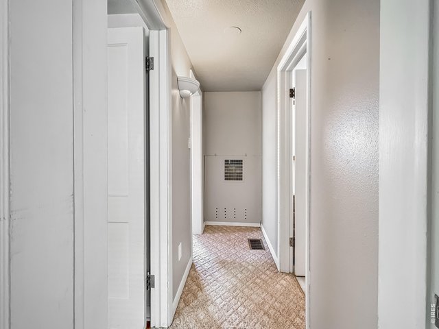 Property Photo 20 Hallway to Bathroom & bedrooms