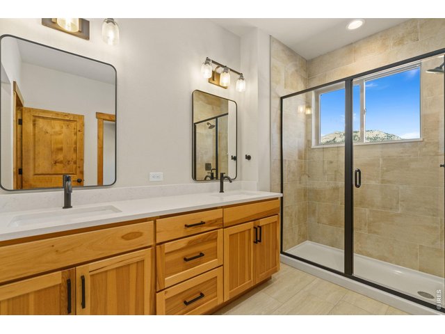 Property Photo 17 Primary bathroom with glass shower