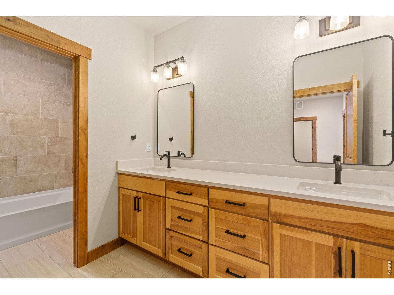  Upstairs guest bathroom with double vanity