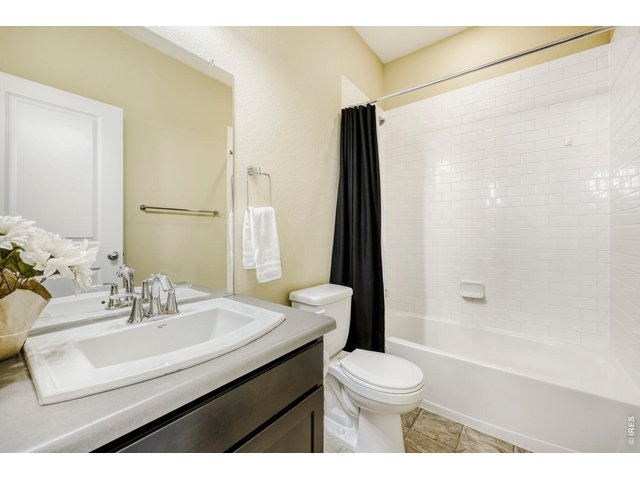 Property Photo 17 2nd bathroom with shower and tub combo