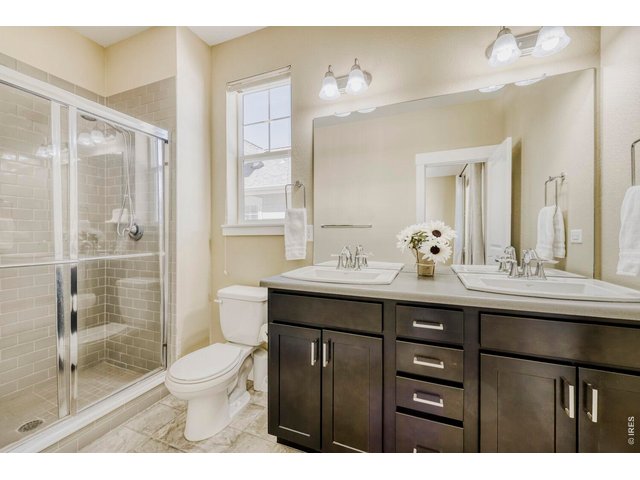 Property Photo 11 Master bathroom with his and hers sinks and a huge walk-in closet.