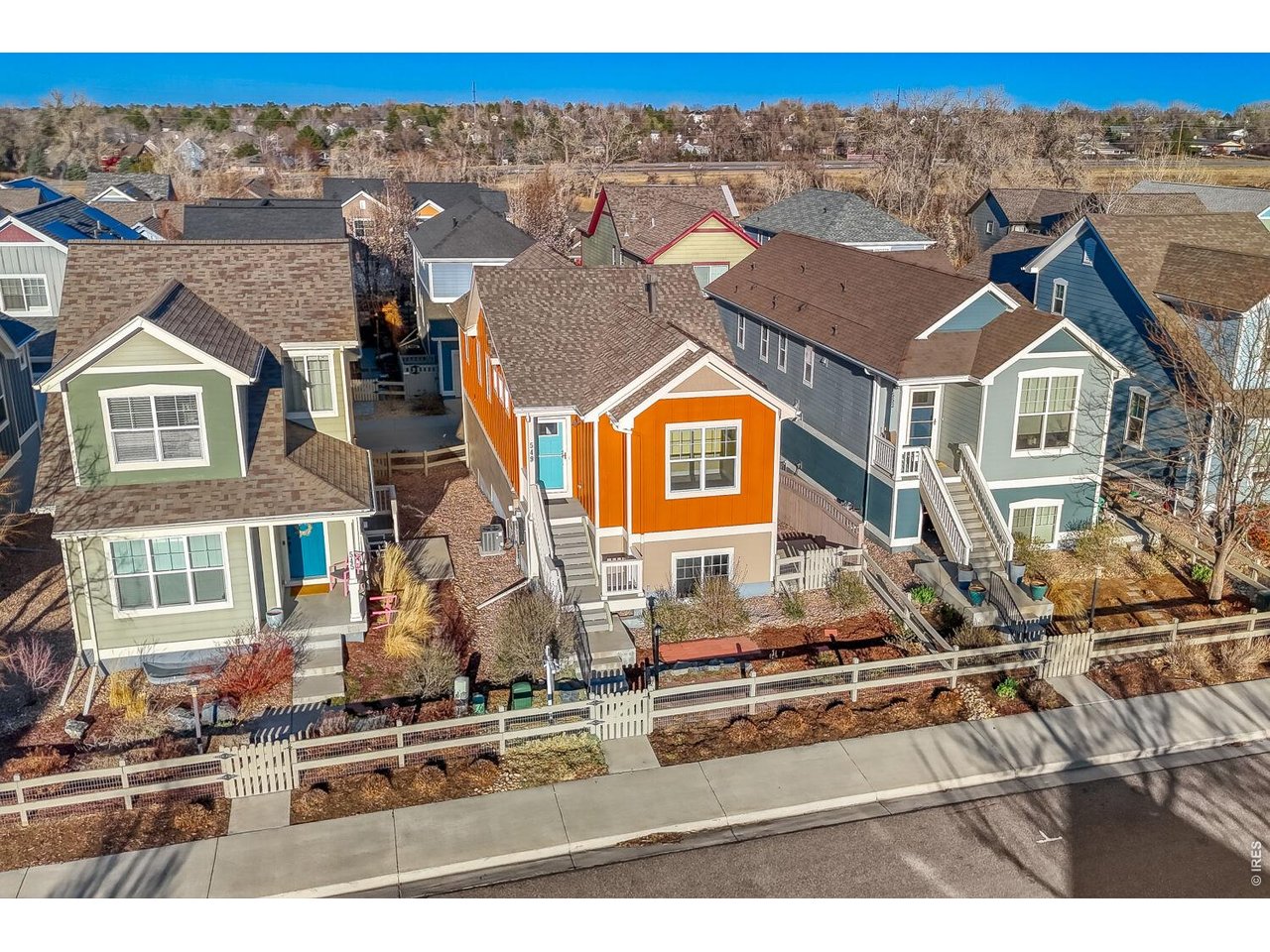 Completely fenced yard with terraced front yard, deck, patio and shaded side yard for growing all your favorite things. 