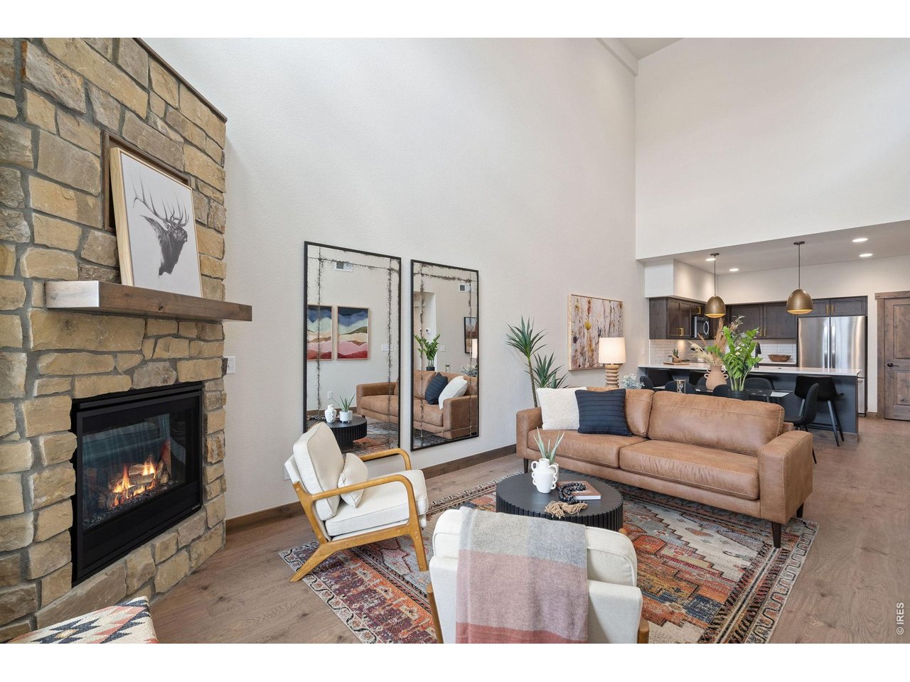 Open concept living area with vaulted ceilings