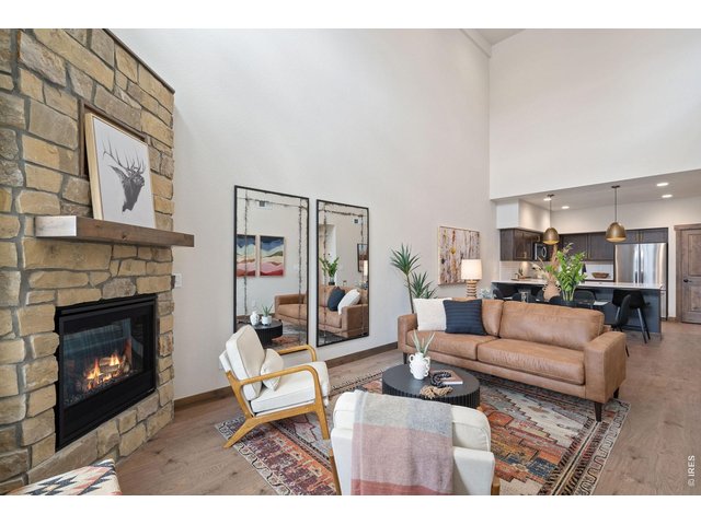Property Photo 4 Open concept living area with vaulted ceilings