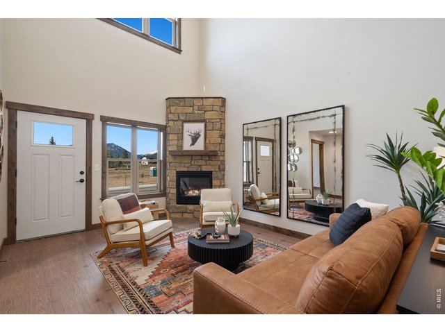 Property Photo 6 Gas fireplace with TV mount above fireplace if desired.