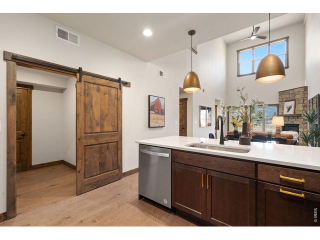 Property Photo 12 Sliding barn door to mud room and laundry room