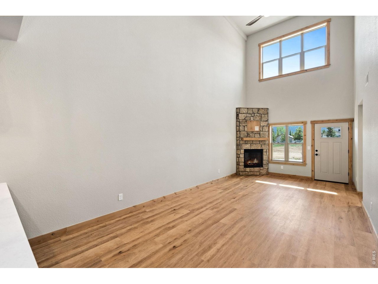 Property Photo 5 Bright and spacious main level with soaring ceilings