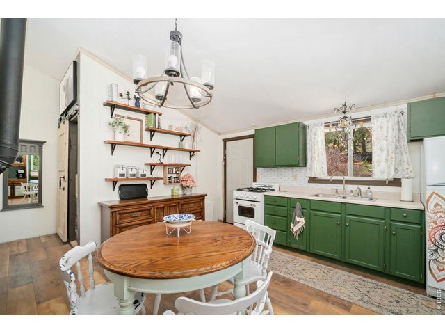Property Photo 8 Updated Kitchen - New Refrigerator, Sink, and Range/Oven