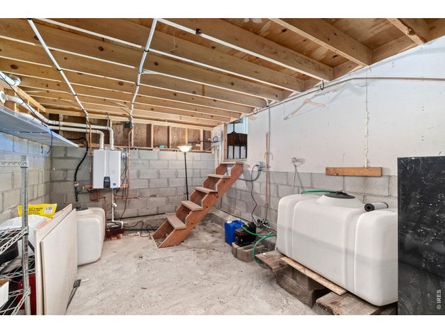 Property Photo 14 Full Height Crawl Space, and Spacious Utility/Storage Room