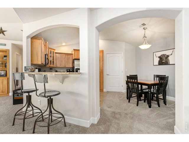 Property Photo 4 Open to kitchen and dining area