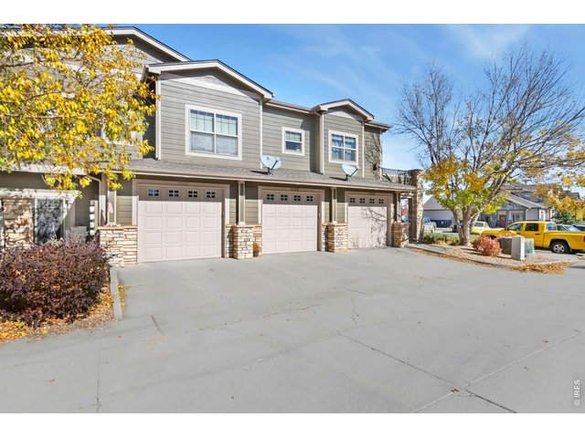 Property Photo 19 1 car attached garage, plus a parking lot