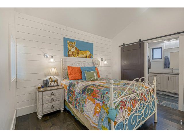 Property Photo 16 Upstairs guest bedroom with attached bathroom