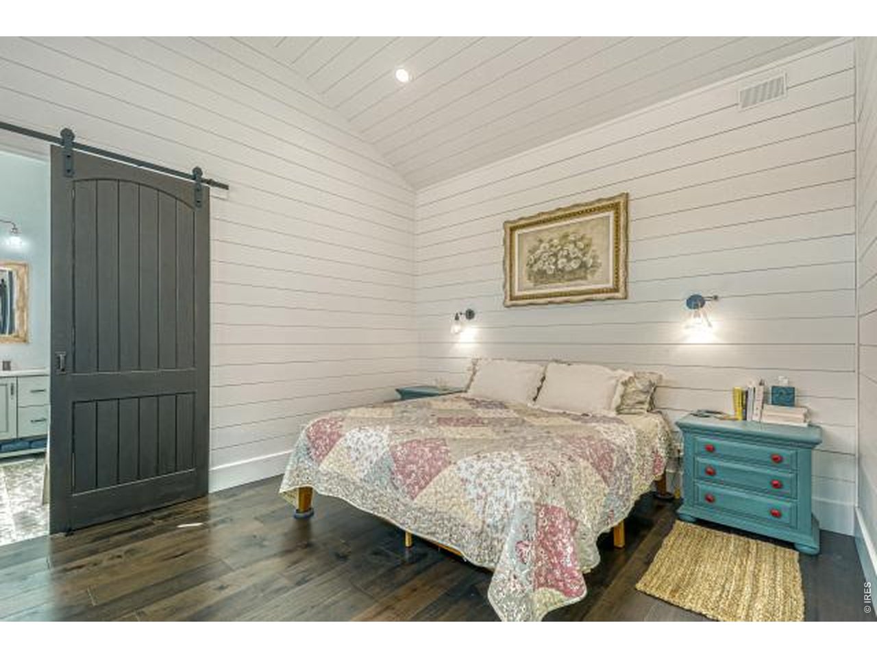 Primary Suite complete with shiplap walls and ceilings