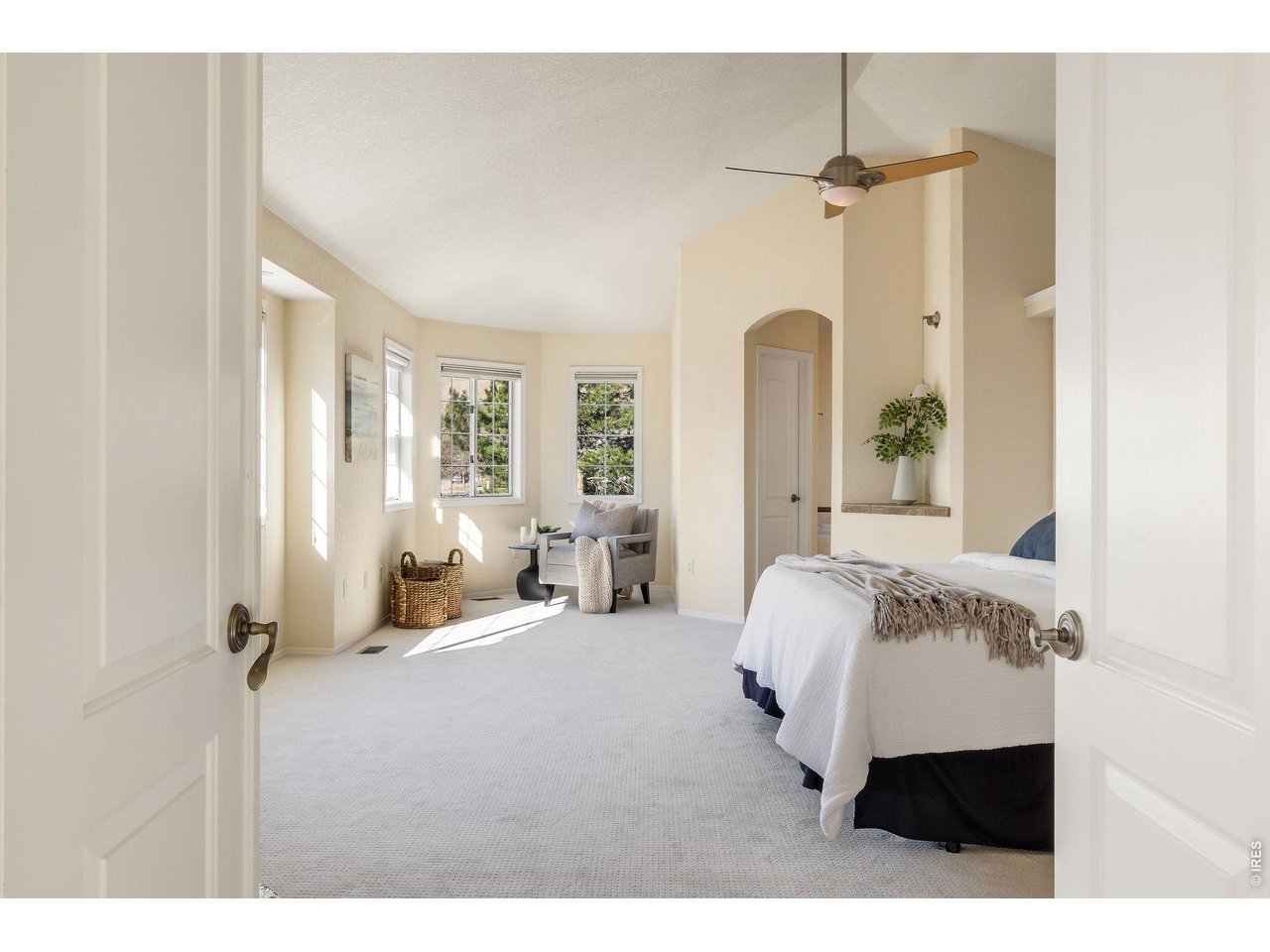 French doors welcome you into the spacious owners' retreat on the upper level.