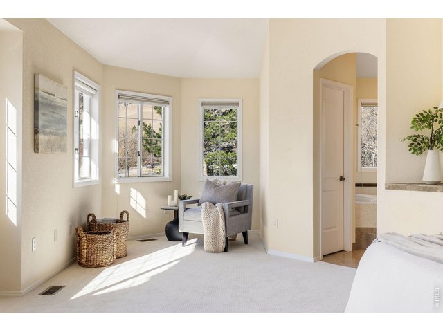 Property Photo 31 Sunlit reading nook in the primary suite with foothill and Flatiron views!