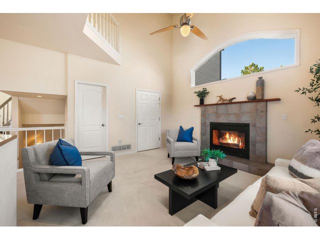 Property Photo 22 Stay cozy by the gas fireplace in the main level family room. 