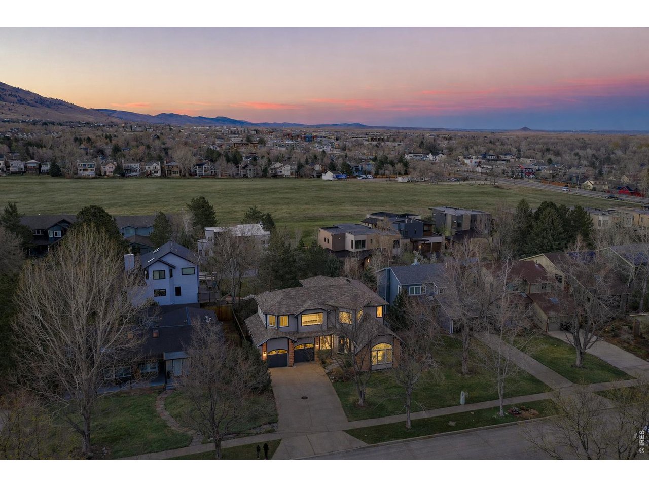 Welcome home to your North Boulder retreat just steps to Lucky's Market! (Image enhanced with Ai to show greener grass)