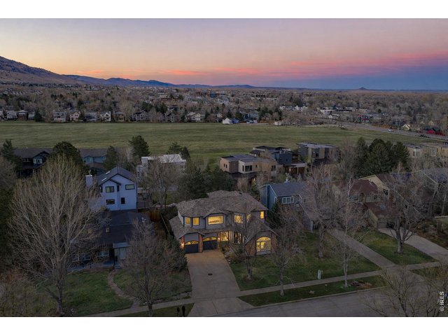 Property Photo 6 Welcome home to your North Boulder retreat just steps to Lucky's Market! (Image enhanced with Ai to show greener grass)