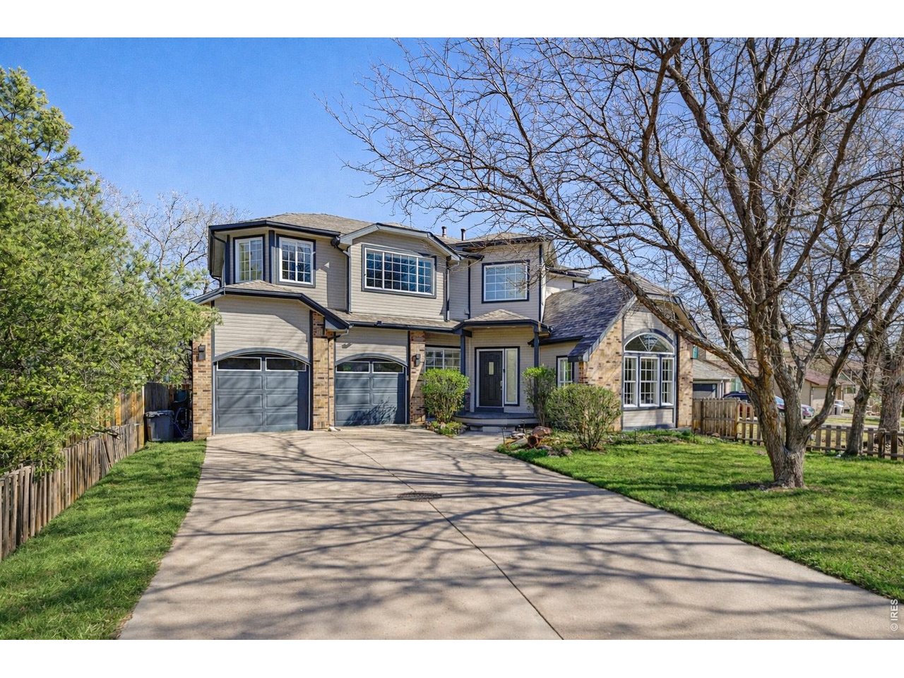 Turnkey elegance in this beautifully maintained North Boulder home. (Image enhanced with Ai to show greener grass)
