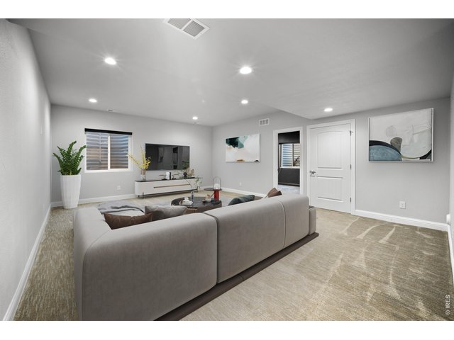 Property Photo 36 Virtually Staged Basement Family Room