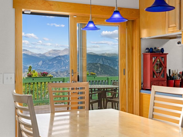 Property Photo 7 Dining Area with a Slider to an Impressive Deck for Al Fresco Dining