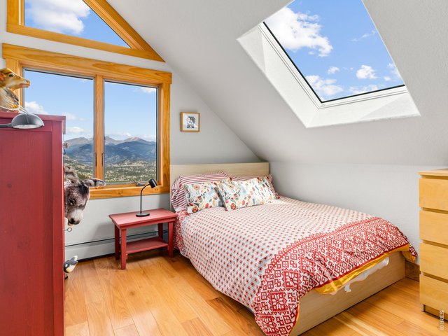 Property Photo 14 Second Bedroom with Skylight