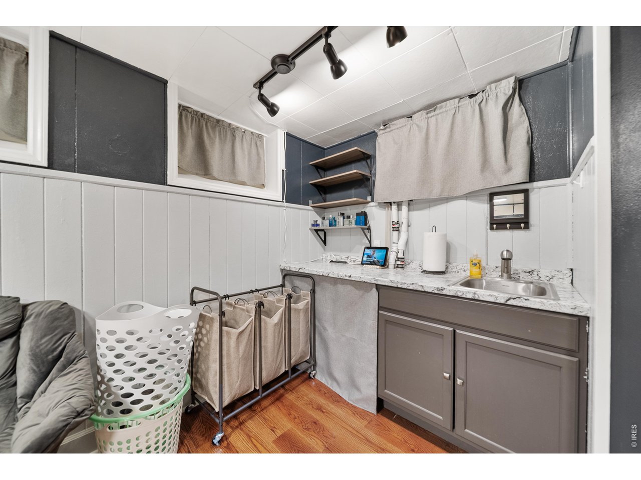 Property Photo 30 Basement Family Room Kitchenette Area