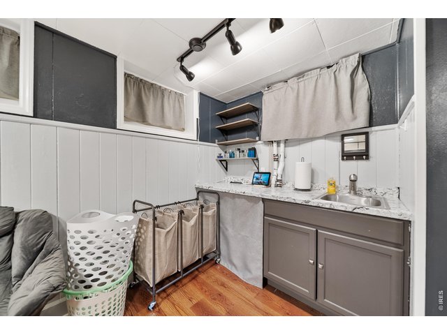 Property Photo 30 Basement Family Room Kitchenette Area
