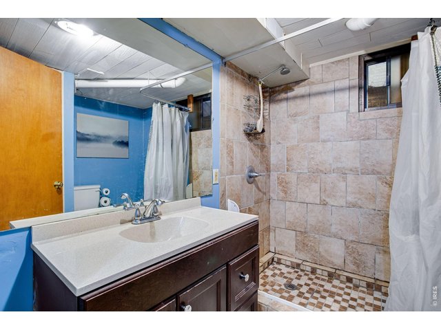 Property Photo 34 Basement: 3/4 bathroom has large, tiled shower.