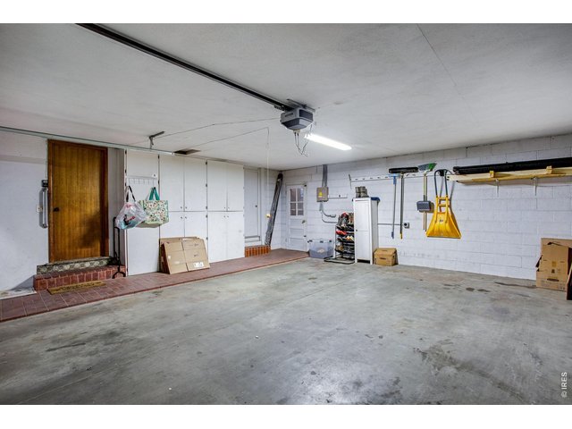 Property Photo 42 Garage: Have an electric vehicle? You also have a full EV charger on the back wall! With the solar, let the sun charge your batteries!