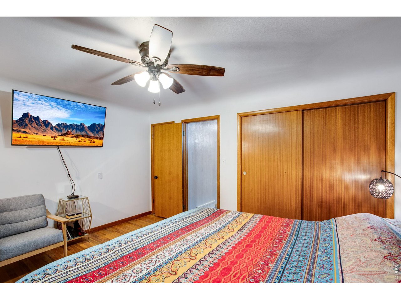 Primary: Original, quality wood doors. There is another closet behind the bedroom door.