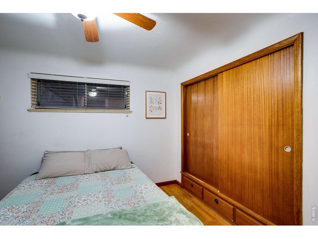 Property Photo 23 Bedroom 2: All three bedrooms have these built-in drawers underneath the closets.