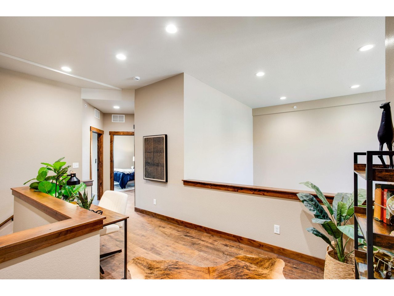 Two additional bedrooms and full bathroom upstairs