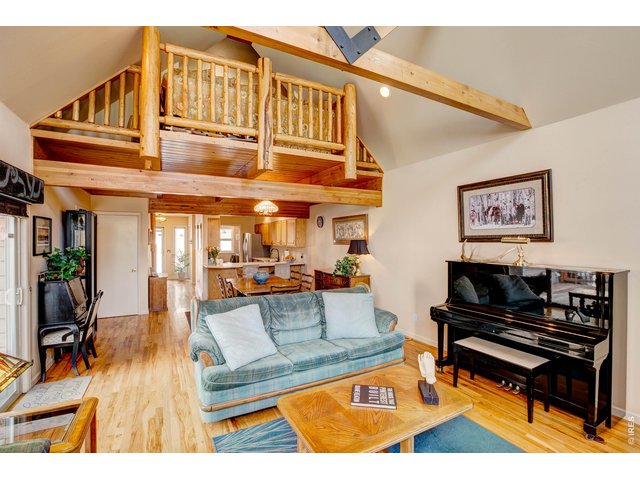 Property Photo 13 Wood log accent staircase and loft