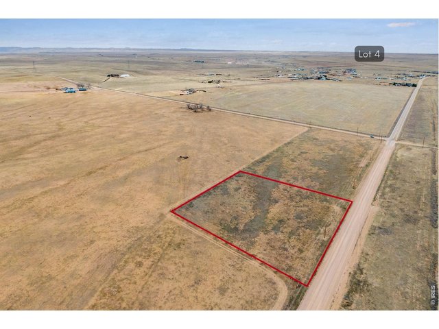 Property Photo 1 Embrace the tranquility of Prairie living with panoramic Rocky Mountain views. Your dream home awaits in Carr, Colorado