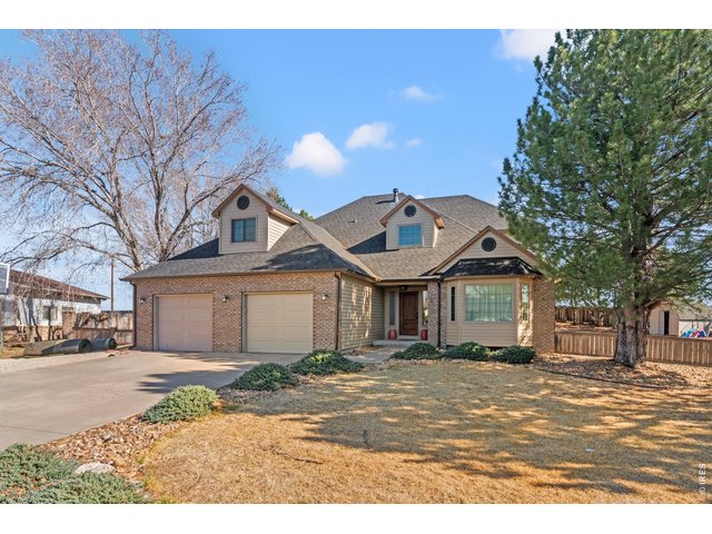 Property Photo 3 Quiet cul-de-sac location across from Petteys Park Golf Course with updated roof and siding for lasting curb appeal.