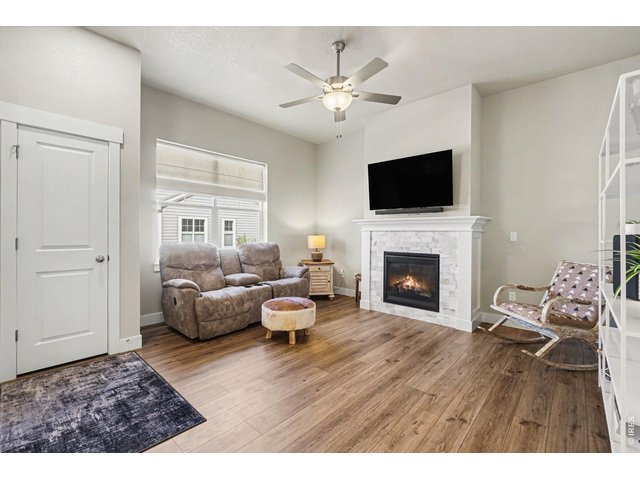 Property Photo 11 Living room with cozy gas fireplace