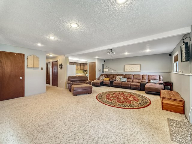 Property Photo 21 Basement Living Room