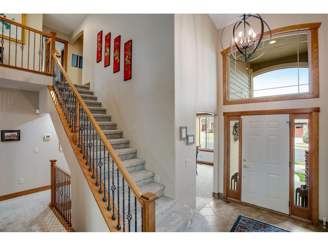 Welcome Home - stunning grand entry and foyer. Beautiful craftsmanship & detail and windows and doorway full cased. 