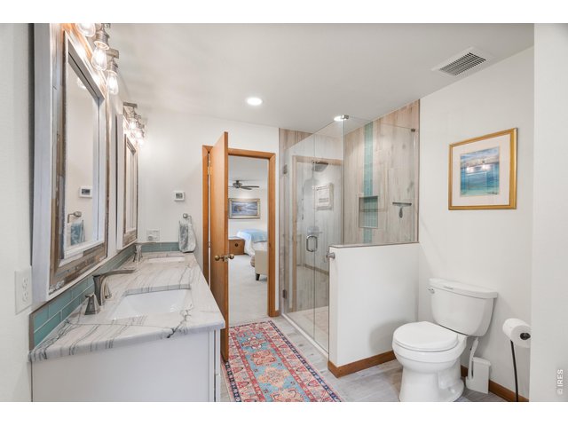 Property Photo 26 5 Piece Bathroom Attached to Second Primary