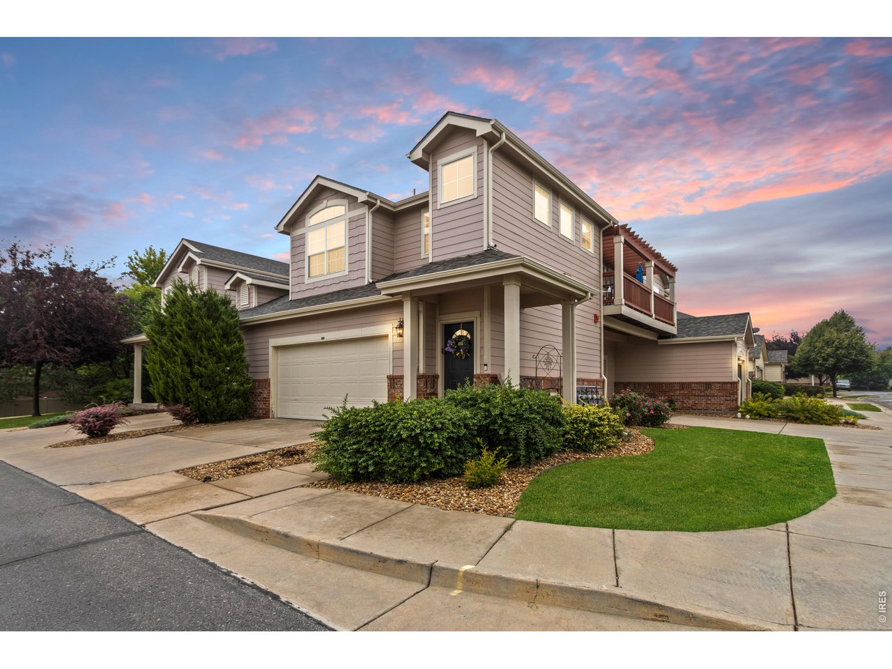 Beautiful end unit condo with attached 2 car garage