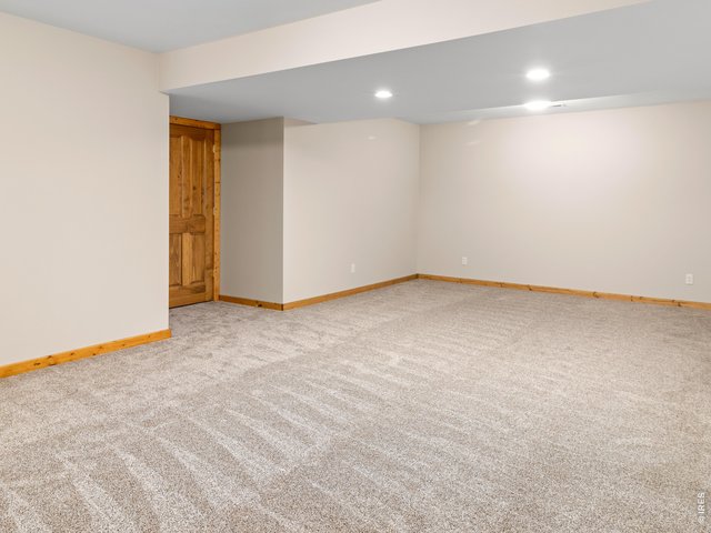 Property Photo 19 High Ceilings on the Lower Level Make it Feel Open