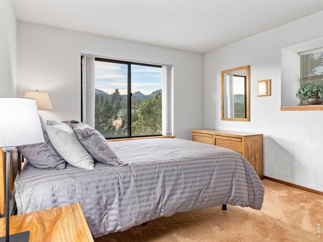 Property Photo 13 Second bedroom with mountain views