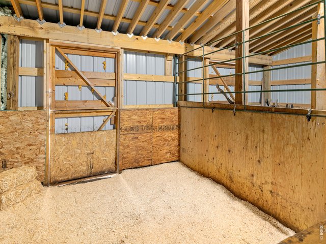 Property Photo 31 1 of 2 stalls on west side of house, could be made into living space or a garage