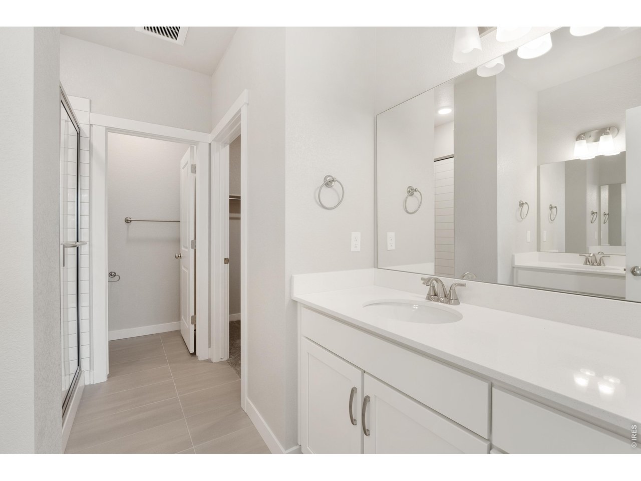 Property Photo 21 Primary bathroom with two vanities