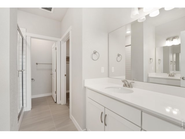 Property Photo 21 Primary bathroom with two vanities