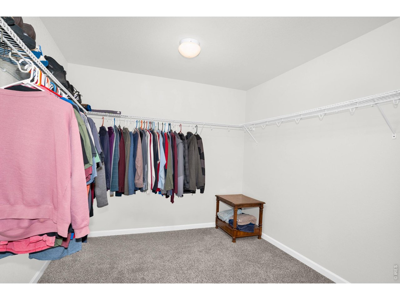 The expansive walk-in closet offers exceptional space to easily accommodate additional dressers, storage pieces, or even a seating area!! 