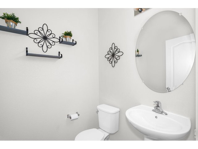 Property Photo 10 A half bath completes the main floor! 