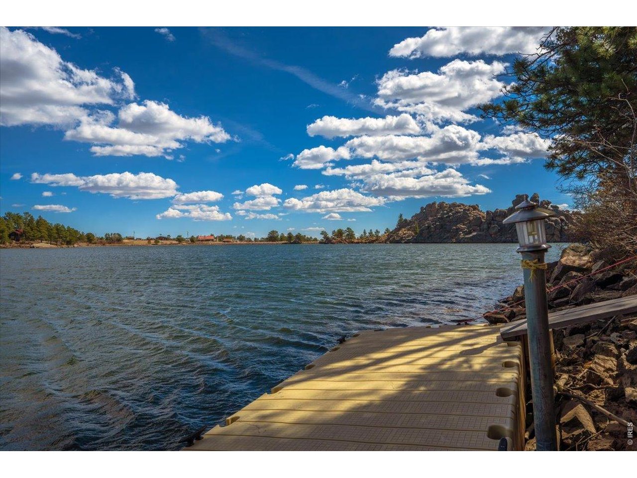Dock on Hiawatha Lake - wake up to cast a line, kayak, or drink your cup of coffee with these views